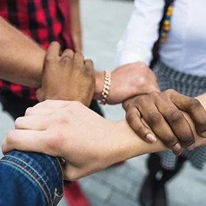close-up-stacked-hands